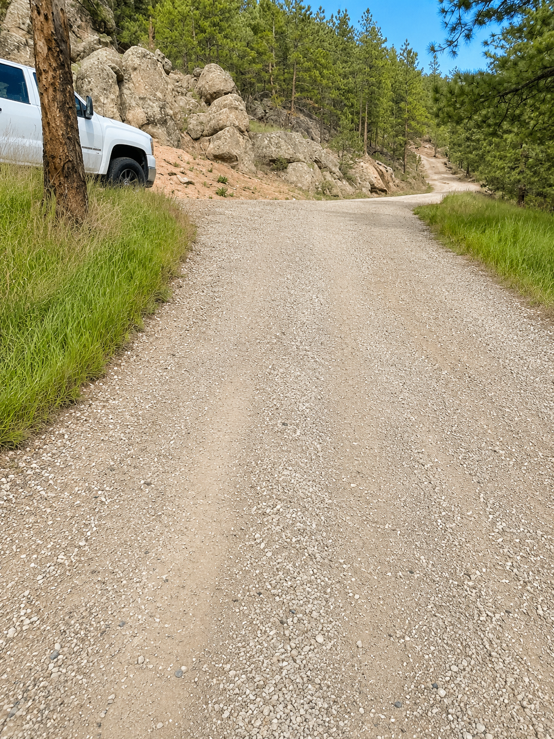 After — smooth regraded and compacted gravel driveway, Boulder County CO